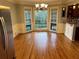 Dining area features bay window and hardwood floors, perfect for Gathering meals at 5741 Wolf Laurel, Lilburn, GA 30047