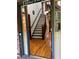 Inviting foyer with hardwood floors and staircase to the upper level at 5741 Wolf Laurel, Lilburn, GA 30047