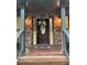 Charming brick home entrance with a welcoming wreath and decorative door at 5741 Wolf Laurel, Lilburn, GA 30047