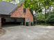 Spacious open two car garage with storage and open door to driveway at 5741 Wolf Laurel, Lilburn, GA 30047