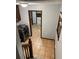 Convenient laundry room accessible from the stairs and hallway provides seamless utility and movement throughout the home at 5741 Wolf Laurel, Lilburn, GA 30047