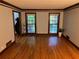 Bright living room with hardwood floors and large windows at 5741 Wolf Laurel, Lilburn, GA 30047