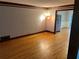 Spacious living room with gleaming hardwood floors and ample natural light at 5741 Wolf Laurel, Lilburn, GA 30047