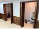 A room with tiled floors, light-colored walls, and wood paneled accents at 5741 Wolf Laurel, Lilburn, GA 30047