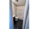 Full bathroom with a tub and shower combo, dark vanity, and black marble flooring at 5947 Rock Rd, Union City, GA 30291