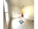 Bright bedroom filled with natural light, neutral walls, and tiled floors for a clean design at 5947 Rock Rd, Union City, GA 30291