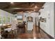 Open-concept living room with hardwood floors and kitchen at 7 Yachting Way, Acworth, GA 30102