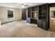 Spacious bedroom with built-in shelving and carpeted floor for a cozy feel at 2864 Sudbury Ct, Marietta, GA 30062