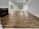 Open-concept dining area with wood floors next to kitchen at 3542 Broad Oak Ct, Decatur, GA 30034