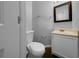 Cozy bathroom features a modern vanity with a large mirror at 3542 Broad Oak Ct, Decatur, GA 30034