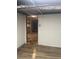 Basement with room to add more rooms and modern flooring throughout at 1433 Woodland Sw Ter, Atlanta, GA 30311