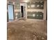 Unfinished basement with exposed floors and walls, offering a blank canvas for renovation projects at 1433 Woodland Sw Ter, Atlanta, GA 30311