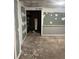 View of an unfinished basement space with built-in cabinets, perfect for customization and upgrades at 1433 Woodland Sw Ter, Atlanta, GA 30311