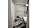 Modern bathroom with white subway tile, black and white marble floor, with a rainfall shower head at 1433 Woodland Sw Ter, Atlanta, GA 30311
