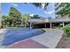Building entrance with covered parking and landscaping at 385 Ralph Mcgill Ne Blvd # Q, Atlanta, GA 30312