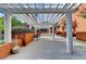 Relaxing community patio with pergola, brick accents, and seating at 385 Ralph Mcgill Ne Blvd # Q, Atlanta, GA 30312