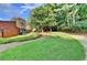 Landscaped grounds with lush greenery and walking paths at 385 Ralph Mcgill Ne Blvd # Q, Atlanta, GA 30312
