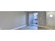 Living room with hardwood floors, balcony access, and neutral walls at 385 Ralph Mcgill Ne Blvd # Q, Atlanta, GA 30312