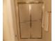 Bathroom featuring frosted glass shower doors and a towel hanging near the shower at 6133 Malloway Ct, Cumming, GA 30041