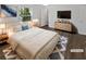 Cozy bedroom with hardwood floors, a large window for natural light, and a stylish decor at 806 Brighton Pt, Atlanta, GA 30328