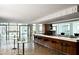 Modern bar with a sleek design, overlooking a refreshing outdoor pool area at 45 Ivan Allen Jr Nw Blvd # 2705, Atlanta, GA 30308