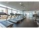 Modern gym with cardio equipment and city views at 45 Ivan Allen Jr Nw Blvd # 2705, Atlanta, GA 30308