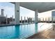 Luxury rooftop pool with city views and lounge chairs at 45 Ivan Allen Jr Nw Blvd # 2705, Atlanta, GA 30308