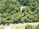 Aerial shot of a house being constructed, with trees and roads nearby at 500 Cochran Rd, Covington, GA 30014