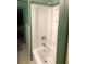 Modern bathtub and shower combination features a sleek design and updated fixtures at 500 Cochran Rd, Covington, GA 30014