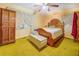 Bedroom with wooden bed frame, large window, and plenty of space at 500 Cochran Rd, Covington, GA 30014