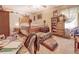 Bedroom featuring decorative bed, antique dressers, and overhead fan at 500 Cochran Rd, Covington, GA 30014