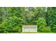 This property has a two-car garage, perfect for storage or parking in a lush green environment at 500 Cochran Rd, Covington, GA 30014
