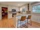 Eat-in kitchen features granite countertops and breakfast bar with seating at 500 Cochran Rd, Covington, GA 30014