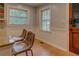 Kitchen with breakfast bar seating and two windows with a view at 500 Cochran Rd, Covington, GA 30014