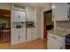 Bright kitchen features white cabinets and granite countertops at 500 Cochran Rd, Covington, GA 30014