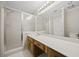 Primary bathroom with walk-in shower, large mirror and white tile flooring at 6 Dover Trl, Peachtree City, GA 30269