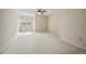 Bedroom featuring carpet, ceiling fan and natural light from window at 6 Dover Trl, Peachtree City, GA 30269