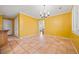 The dining room is bright with tile floors and a large window at 6 Dover Trl, Peachtree City, GA 30269