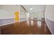 Spacious living room with hardwood floors and staircase at 6 Dover Trl, Peachtree City, GA 30269