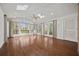 Bright sun room with skylights, large windows, and hardwood floors at 6 Dover Trl, Peachtree City, GA 30269
