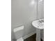 Bathroom with a white, modern sink and toilet at 3213 Cedar Bluff Ne Dr, Marietta, GA 30062