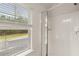 Clean bathroom with shower and window offering natural light at 565 Abbott Se Ct, Atlanta, GA 30354