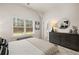 Bedroom with large window and dresser at 565 Abbott Se Ct, Atlanta, GA 30354