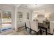 Bright dining room with a table and chairs, hardwood floors, and a chandelier at 565 Abbott Se Ct, Atlanta, GA 30354