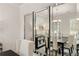 Modern dining room with a large mirror reflecting the space at 565 Abbott Se Ct, Atlanta, GA 30354