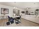 Open concept dining and living area with hardwood floors and modern decor at 565 Abbott Se Ct, Atlanta, GA 30354
