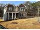Two-story home with a brick exterior and a grassy yard at 565 Abbott Se Ct, Atlanta, GA 30354