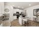 Island kitchen with granite countertops and stainless steel appliances at 565 Abbott Se Ct, Atlanta, GA 30354