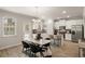 Open floor plan with kitchen, dining area and access to backyard at 565 Abbott Se Ct, Atlanta, GA 30354