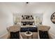 Main bedroom with king-size bed and sitting area at 565 Abbott Se Ct, Atlanta, GA 30354